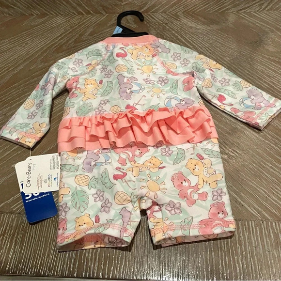 NWT Care Bears Swim Rash Guard Onesie with Ruffle Bottom 50+ UPF (3-6 Months) - Picture 2 of 5